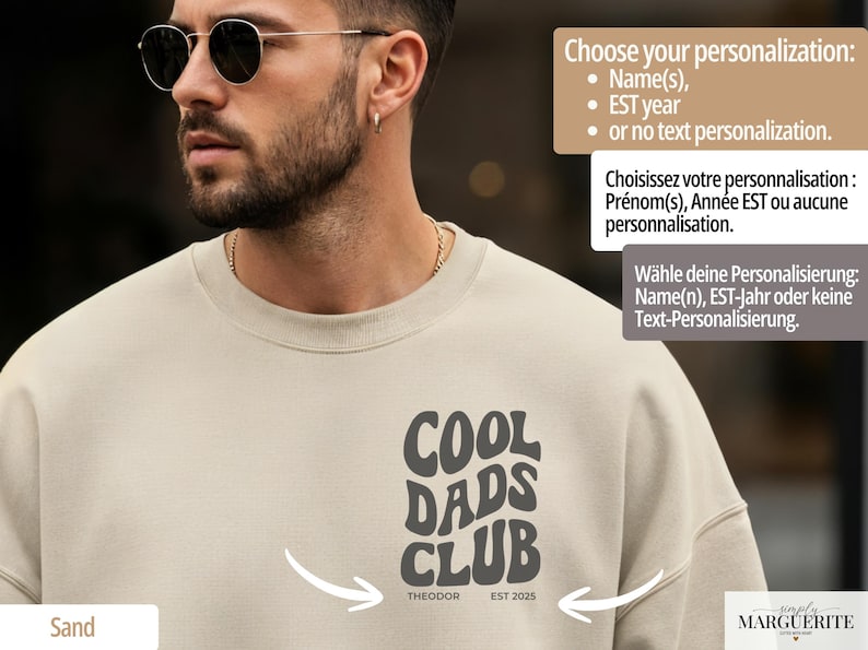 May include: Sand-colored sweatshirt with the text "COOL DADS CLUB" in a retro font. The text includes "THEODOR" and "EST 2025". The sweatshirt offers personalization options for names and EST year.