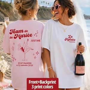 Könnte beinhalten: Ein hellrosa T-Shirt mit rotem Text Team de Mariée, Justine, EVJF MANON, le 12 septembre 2026 und einem Martiniglas-Motiv sowie ein weißes T-Shirt mit rotem Text La Mariée, MANON, mit Druckmotiven auf der Vorder- und Rückseite.