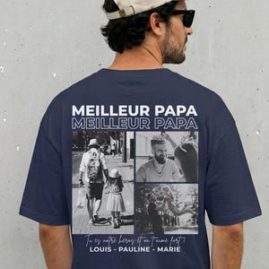 K&ouml;nnte beinhalten: Marineblaues T-Shirt mit dem wei&szlig;en Text "MEILLEUR PAPA". Das Shirt zeigt vier Schwarz-Wei&szlig;-Fotos und den Text "Tu es notre h&eacute;ros et on t'aime fort".