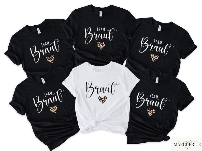 Pu&ograve; includere: Una collezione di magliette nere e bianche. Ogni maglietta presenta la scritta "Team Braut" in un carattere corsivo, con un cuore con stampa leopardata. Le magliette sono probabilmente per un addio al nubilato.