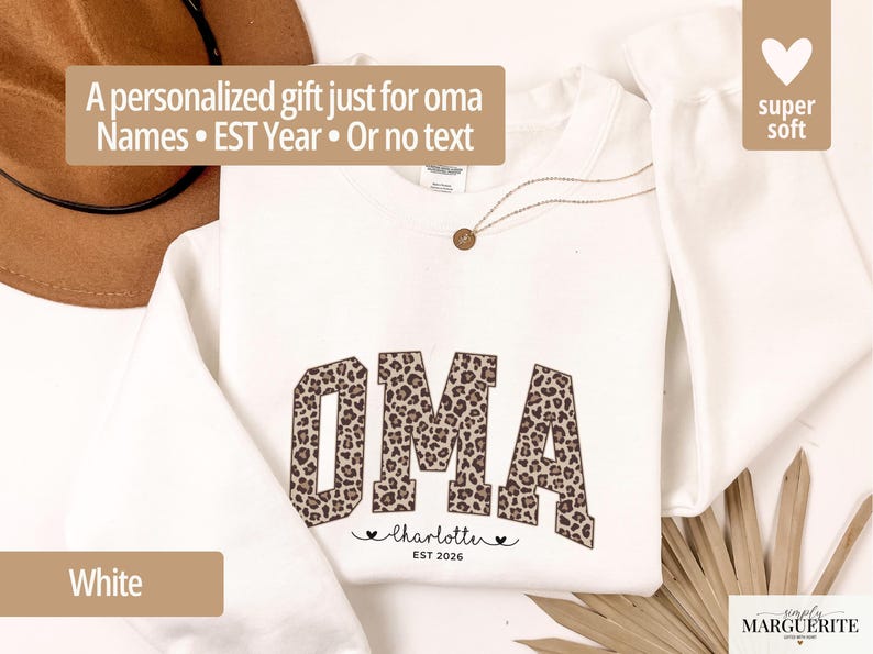 May include: White sweatshirt with the word "OMA" in a leopard print design. Below the word "OMA" is the name "Charlotte" and the year "EST 2026". The text "A personalized gift just for oma" is at the top.