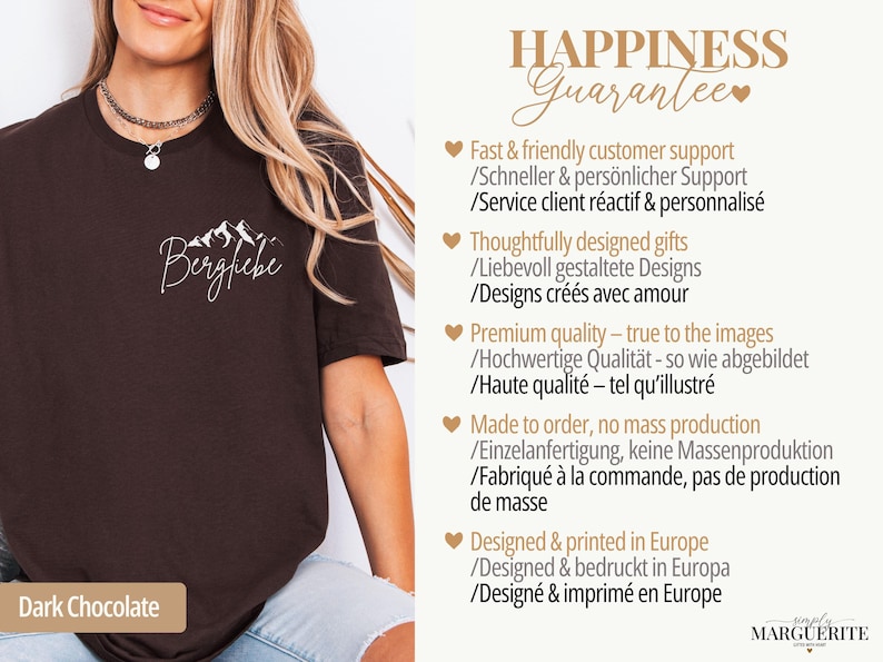 May include: Dark chocolate-colored t-shirt with the word "Bergfiebe" and a mountain graphic in white. The shirt has a crew neck and short sleeves. The text "Dark Chocolate" is at the bottom.