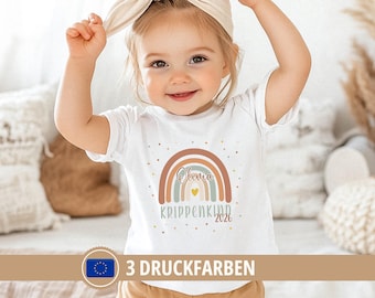 Personalisiertes Krippenkind T-Shirt mit Name & Wunschmotiv, Kinderkrippe Shirt, Geschenk Kita Start Eingewöhnung, Krippenstart 2026