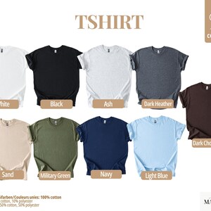 May include: A selection of t-shirts in various colors, including white, black, ash, dark heather, dark chocolate, sand, military green, navy, and light blue. The shirts are made of 100% cotton, with some heather colors having a polyester blend.