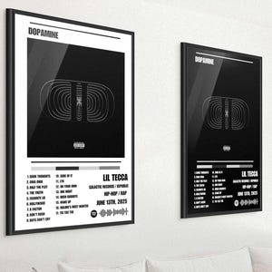 May include: Two framed posters with black frames. The posters display the word "DOPAMINE" at the top, a central graphic, and a list of song titles. The artist's name, "LIL TECCA," and album details are also included. The posters are for a hip-hop/rap album.