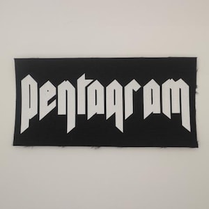 May include: White "Pentagram" text on a black fabric patch.