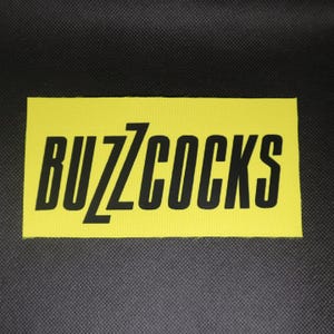 Buzzcocks - Logo Patch Yellow/Black