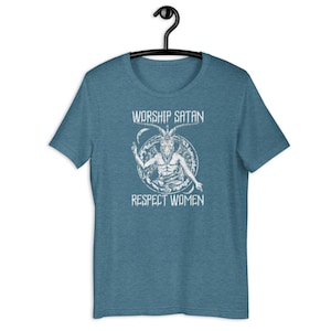 May include: A blue t-shirt with a white graphic of a goat-headed figure in a circle with the text "Worship Satan Respect Women".