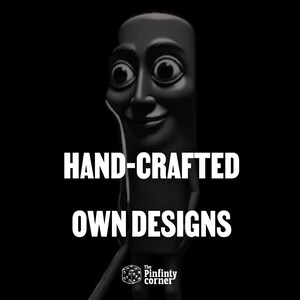May include: A black and white image of a cartoonish figure with a smiling face and large eyes. The text "HAND-CRAFTED OWN DESIGNS" is displayed in bold white letters. The logo for "The Pinfinty Corner" is in the bottom right corner.
