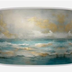 May include: Cylindrical lampshade with an abstract seascape design. It depicts a turquoise ocean with white waves, beneath a sky of gold and grey clouds. The lampshade has a white trim at the top and bottom.