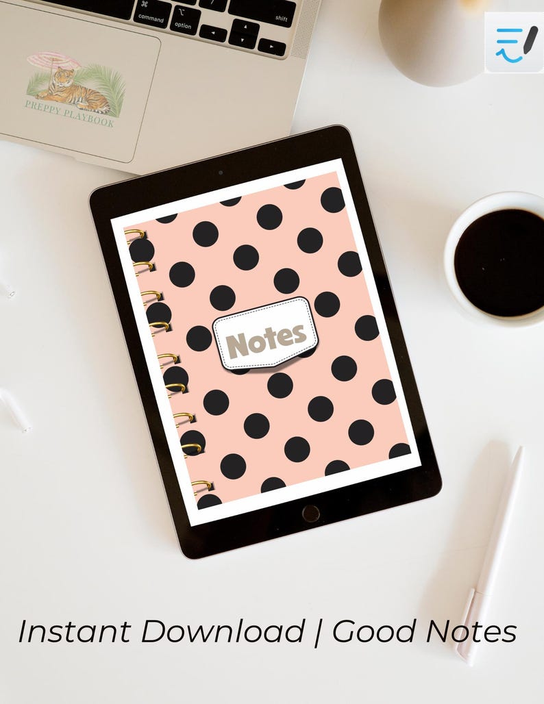 May include: A digital tablet displaying a spiral-bound notebook cover design with a light peach background and a repeating pattern of solid black polka dots. A central white rectangular label with a stitched border features the word Notes in gray.