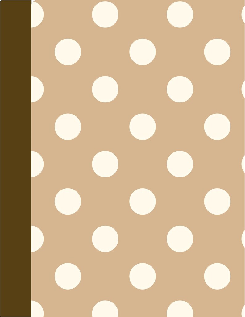 May include: A notebook cover featuring a repeating pattern of off-white polka dots on a light tan background, with a solid dark brown vertical spine strip running along the left edge of the rectangular surface.