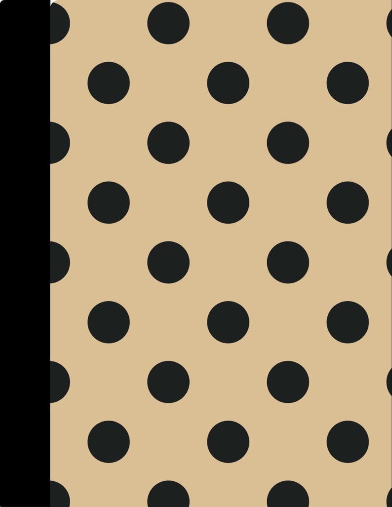 May include: A rectangular notebook featuring a tan cover with a repeating pattern of solid black polka dots. The left side of the notebook has a solid black vertical spine strip that runs the entire length of the cover, contrasting with the tan background.