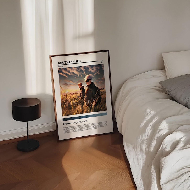 May include: A framed poster with a white background and black text. The poster features a scene from the anime "Jujutsu Kaisen" with two characters standing in a field. The text on the poster reads "Jujutsu Kaisen" and "Creator: Gege Akutami".
