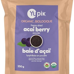 May include: A brown paper bag with a purple label that says "Yupik Organic. Biologique Freeze-Dried Acai Berry Powder Baie d'Acai Lyophilisée en Poudre" with a picture of acai berries and a small bowl of acai powder. The label also says "Source of fiber. Source de fibres High in iron. Teneur élevée en fer GMO-free. Sans OGM" and has a USDA Organic seal. The bag is 250 grams.