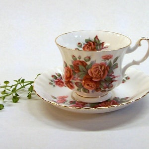 Vintage Royal Albert Centennial Rose Footed Tea Cup & Saucer, Pink Roses, Green Leaves Scalloped Gold Trim, English Bone China