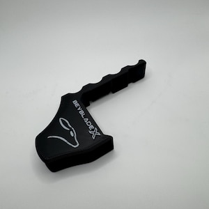 May include: Black plastic Beyblade launcher with a white logo that says "BeybladeX" and a stylized image of a spinning top.