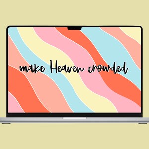 May include: A laptop computer with a colorful abstract background and the text "make Heaven crowded" on the screen.