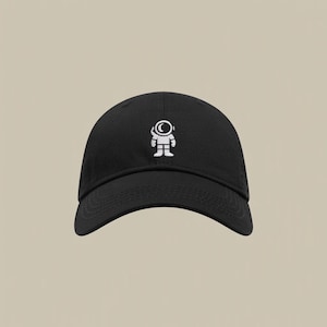 Minimalist White Astronaut Emblem on Black Baseball Cap