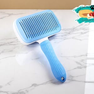 Pet Grooming Brush Tool | Dog Cat Hair Remover | Long Cleaning Comb | Bath Time Material for Pets | Easy Shedding Solution