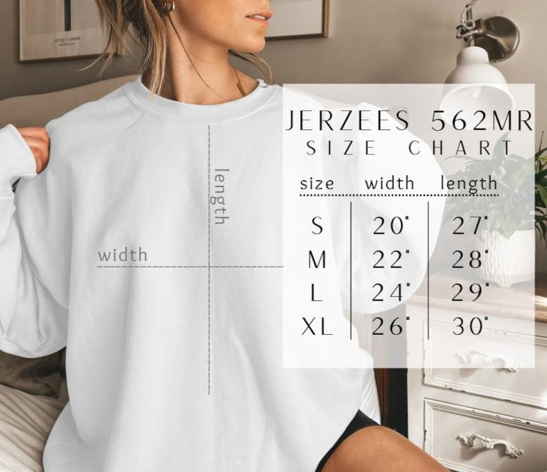 May include: A white long-sleeve sweatshirt with a size chart overlay labeled JERZEES 562MR. The chart lists sizes S, M, L, and XL with corresponding width and length measurements in inches, ranging from 20 to 26 inches wide and 27 to 30 inches long.
