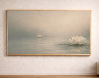 May include: A framed art print featuring two white lotus flowers floating on a serene body of water. The artwork has a soft, muted color palette with a light brown wooden frame, creating a calming and peaceful atmosphere. The water reflects the flowers.