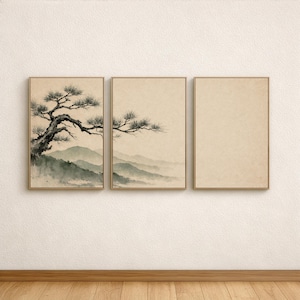 May include: A triptych of framed art prints featuring a serene landscape. The left panel depicts a detailed black and white tree with a mountain range in the background. The middle panel shows a similar mountain scene. The right panel is blank.