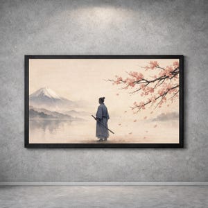 May include: Framed artwork depicting a serene Japanese landscape. A figure in a kimono stands with a sword, facing a mountain and lake. Cherry blossoms in pink and red adorn the scene, with a soft, muted color palette.