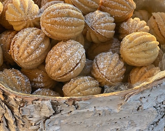 Walnut shaped Ukranian Cookies with caramel filling. Melts in your mouth. Very crumbly and soft. Made to order.