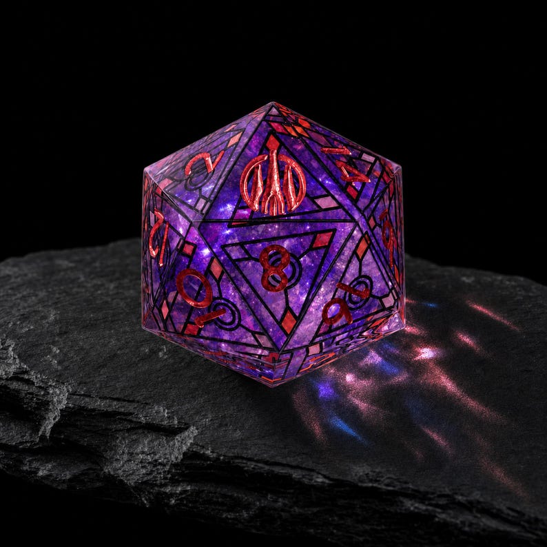 May include: A twenty-sided die featuring a translucent purple and blue galaxy-like interior with intricate black geometric linework and metallic red numbering. The die displays a prominent red symbol on the top face and clear numerical digits.