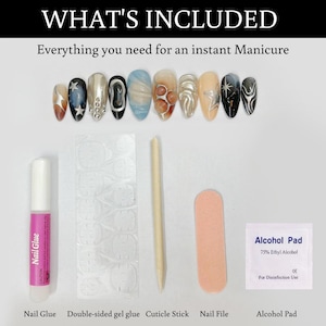 May include: A set of nail art supplies including nail glue, double-sided gel glue, a cuticle stick, a nail file, and an alcohol pad. The text "WHAT'S INCLUDED" and "Everything you need for an instant Manicure" is at the top of the image. The alcohol pad has the text "Alcohol Pad", "75% Ethyl Alcohol", "CE", and "For Disinfection Use" printed on it.