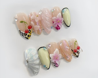 Ongles colorés à presser pour l'été, cerise florale unique, imprimé léopard, faux ongles, colle en strass sur un ensemble d'ongles amusant