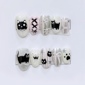 Cute Goth Black Cat - Bow Nail Art - Playful Press On Nails with Lacing, Paw Prints & Stars - Cat nails