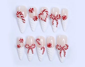 Unghie finte natalizie con fiocco a forma di bastoncino di zucchero, 3D, French, bianche e rosse / Natale