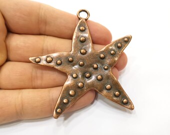 2 Starfish pendants antique copper tone CC5