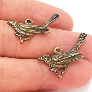 4 Bird Charms Antique Bronze Plated Charms  (30mm)  G22823