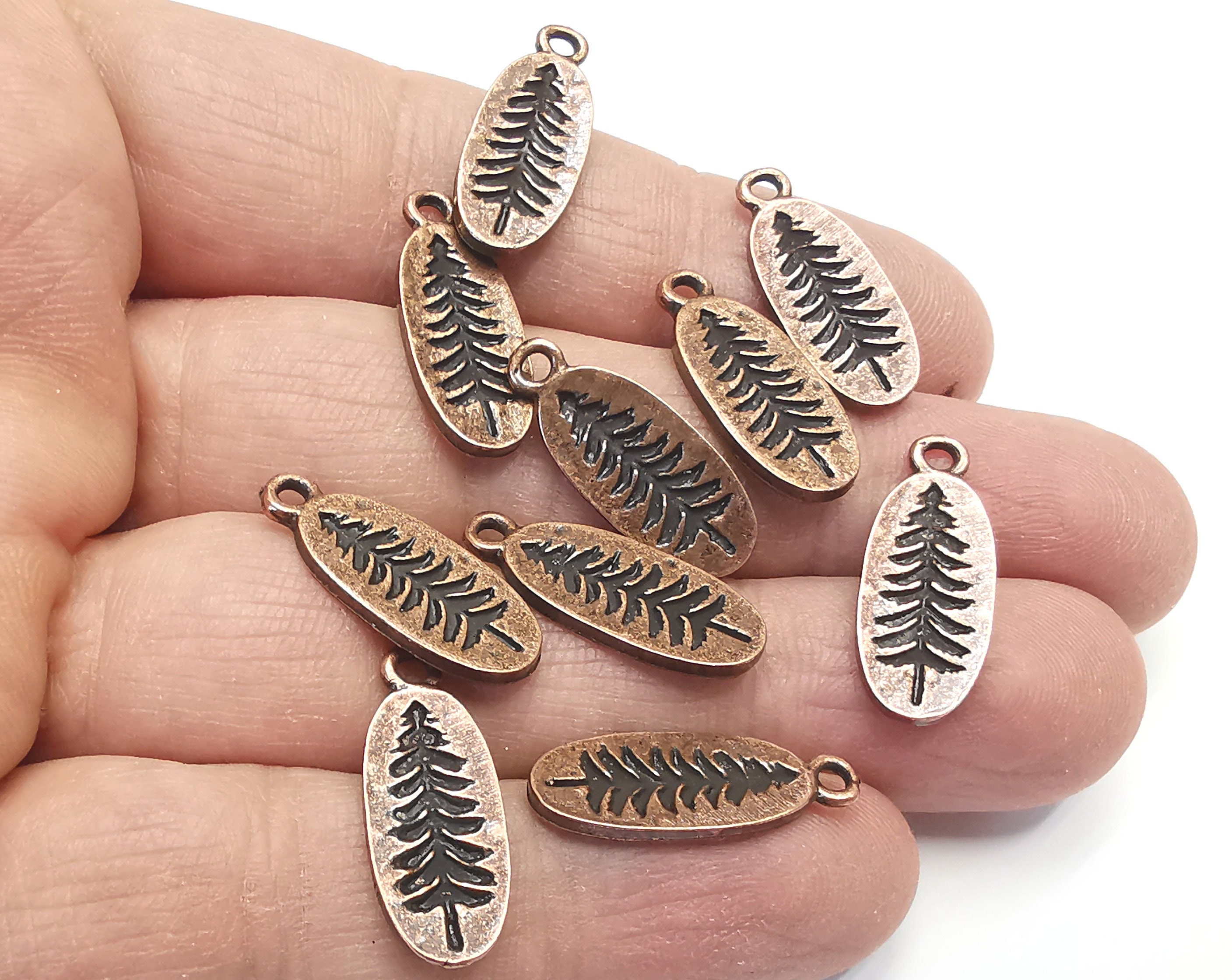 Breloques en pin plaquées cuivre antiques (24 x 9 mm) G27236
