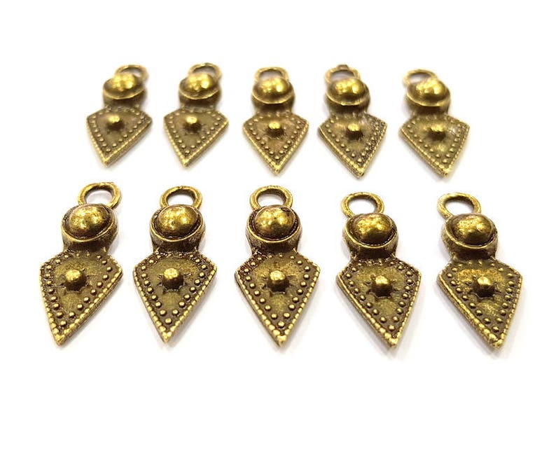 G10930 10 Antique Bronze Charm Antique Bronze Plated Metal 22x8mm
