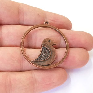 2 Bird charms Antique copper plated charms (41x38mm) G23922