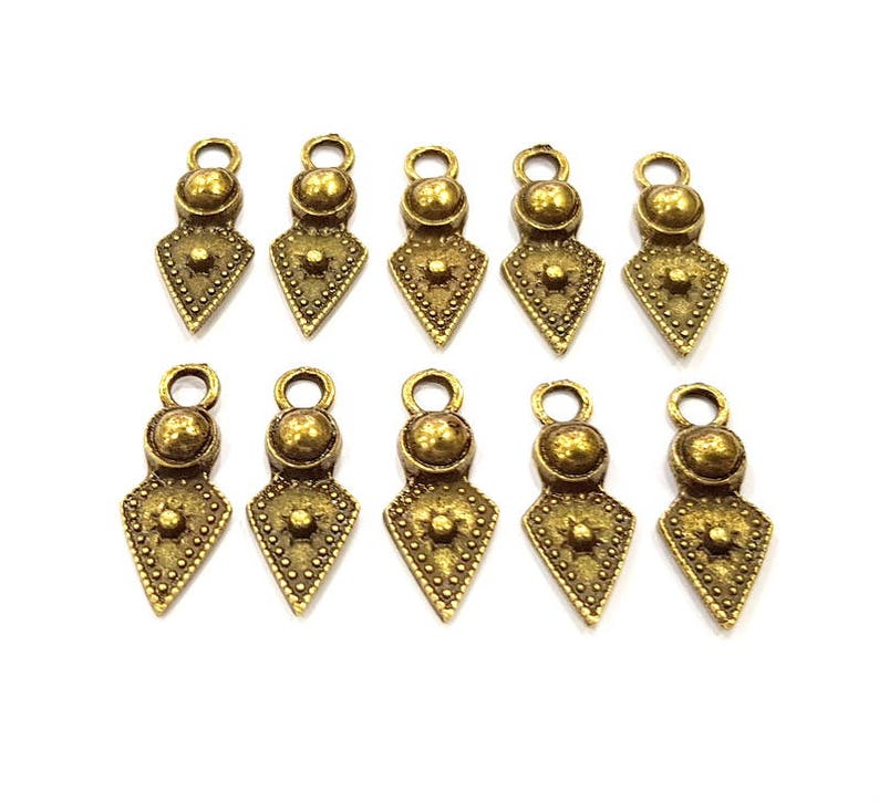 G10930 10 Antique Bronze Charm Antique Bronze Plated Metal 22x8mm