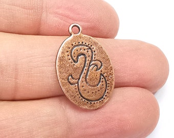 Dijes chapados en cobre. Dijes colgantes antiguos chapados en cobre (25 x 16 mm). G29892
