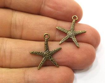 10 ciondoli a forma di stella marina placcati in bronzo antico (20 x 18 mm) G18329