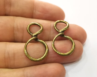 2 ciondoli a forma di albero di pino placcati in bronzo 2 ciondoli a forma di albero di pino placcati in bronzo