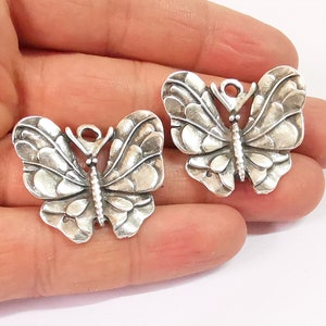 Breloques papillon Breloque plaquée argent antique (33 x 30 mm) G24650