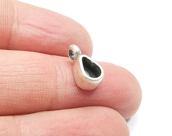 May include: Silver pendant with a teardrop-shaped bezel, perfect for adding a touch of elegance to jewelry projects.
