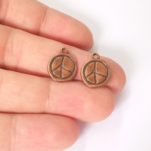 10 Peace charms Antique copper plated charms (16x13mm)  G23598