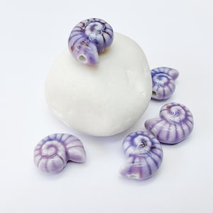 Paarse porseleinen nautiluskralen, keramische schelpkraal, zomerzeekraal, Ocean Jewelry Supply, strandthemakralen, ammonietkralen 20 x 16 mm G37167