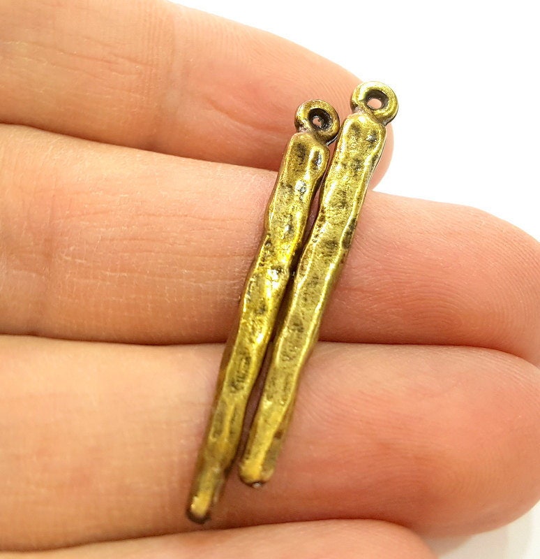Ciondolo in lega di bronzo anticato e patina verde in stile