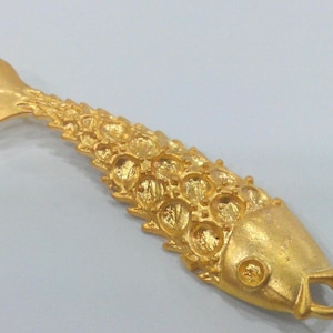 Fish Pendant  Gold Plated Metal (65x17 mm.)  G21257