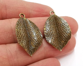 4 Curved Leaf Charms Antique Bronze Plated Charms (35x20mm)  G21354